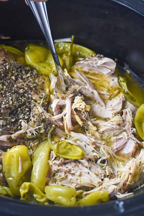 This tender Slow Cooker Greek Pork has amazing flavor, only requires a few ingredients and is so simple to make in the crock pot. Italian Roast Pork Sandwich Crockpot, Savory Pork Loin Crock Pot Recipes, Greek Pork Tenderloin Recipes, Potluck Dishes Crockpot, Greek Pork Tenderloin, Spanish Pasta, Tenderloin Recipes Crockpot, Pork Loin Crock Pot Recipes, Greek Pork