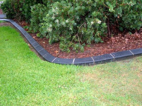 Creating a boundary for your garden is a great way to enhance your garden’s appearance and show off your creativity. You can get a lot of materials fr... | Go Classic with Black Brick Edging #gardenedging #edginggarden #garden #gardens $edges #gardenedges #decoratedlife Landscape Border Ideas, Concrete Garden Edging, Landscape Border, Brick Garden Edging, Landscape Borders, Front Garden Landscape, Border Ideas, Brick Garden, Front Garden Design