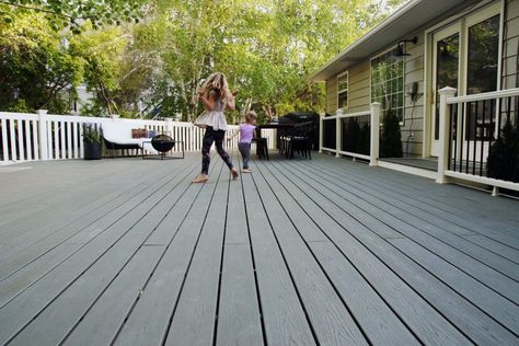 Our Finished Deck! Clam Shell Trex Decking, Trex Clam Shell Deck, Trex Clam Shell, Trex Deck Ideas, Patio Redo, Trex Enhance, Concrete Stain Patio, Diy Outdoor Fireplace, Low Deck