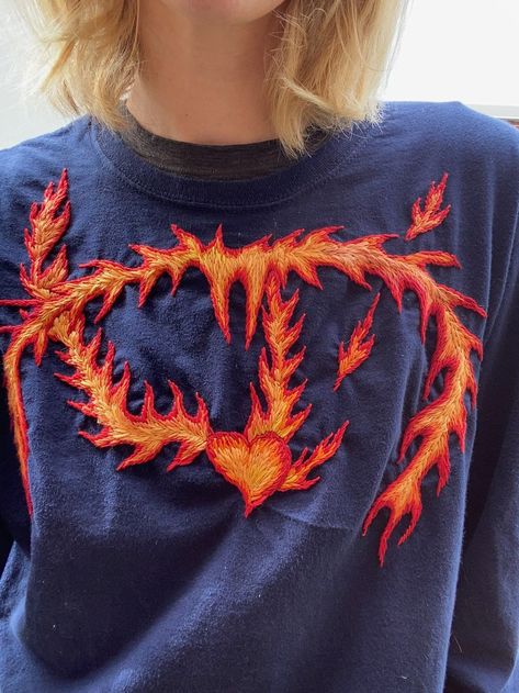 repuposed shirt with flame heart embroidery by tessa perlow Tessa Perlow, Flame Heart, Heart Embroidery, Heart Shirt, Embroidery Fashion, Embroidery, Sweatshirts, Trending Outfits, Unique Jewelry