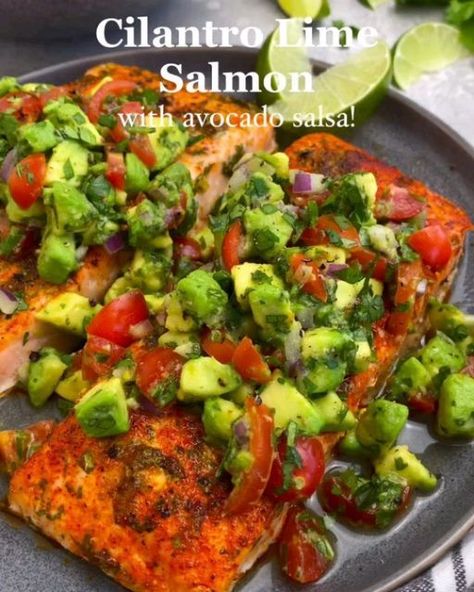 Healthy Eating on Instagram: "CILANTRO LIME SALMON with AVOCADO SALSA!😍 by @kalefornia_kravings  .  Easy✔️ Delicious✔️ Ready in less than 30 minutes!✔️ This salmon dish is loaded with flavor! Featuring salmon fillets baked to perfection in a tangy cilantro-lime sauce then topped with the BEST avocado salsa!🥰 It’s a flavorful & satisfying meal you’re going to love!🤗  .  Click the link in her bio⬆️ & search “Cilantro Lime Salmon” in the search bar.  .  What you’ll need for the salmon:  Salmon fillets  Olive oil  Lime juice  Lime zest  Cilantro  Smoked paprika  Salt  Black pepper  .  What you’ll need for the avocado salsa:  Avocados  Tomatoes  Red onion  Cilantro  Limes  Salt & black pepper, to taste" Kalefornia Kravings, Cilantro Lime Salmon, Salmon With Avocado, Salmon Recipes Baked Healthy, Salmon With Avocado Salsa, Lime Salmon, Healthy Baking Recipes, Lime Sauce, Baked Salmon Recipes