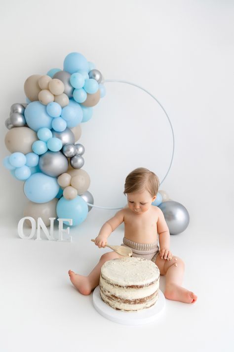 Little boy sitting smashing cake during photshoot session with blue balloon set up Smash Cake Boy Photoshoot, Balloon Cake Smash, Megan Foster, Cake Smash Boy, Boy Photoshoot, Cake Boy, Smash Cake Boy, Blue Balloon, Balloon Cake