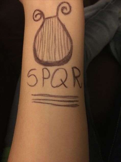 I did it better and correct this time apollo roman tattoo from camp Jupiter I would rather be Athenas daughter but she is a maiden when roman I am Greek but they don't have tattoos Camp Jupiter Tattoo, Spqr Tattoo, Jupiter Tattoo, Pjo Oc, Roman Tattoo, Camp Jupiter, I Would Rather, I Did It, The Meaning