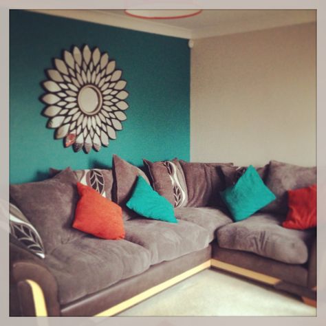 Living room, teal and orange. Teal And Orange Living Room, Orange Living Room Ideas, Living Room Teal, Orange Living Room, Coral And Teal, Purple Living Room, Teal And Gray, Grey Couch, Teal And Orange