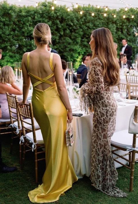 Two women in a wedding standing next to the table in long dresses Yellow Wedding Guest Outfit, Yellow Wedding Guest Dresses, References Photos, Silk Yellow Dress, Wedding Guest Gowns, Wedding Guest Style, Insta Profile, Prom Dress Inspiration, Yellow Wedding