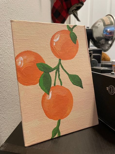 This item is an acrylic painting of oranges on canvas. These are hand painted and could vary slightly piece by piece.