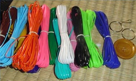 Plastic lacing for craft projects has different names, such as Rexlace, gimp and even boondoggle, depending on the manufacturer. No matter what you call it, it is a great craft material for making keychains and bracelets. Plastic Lace Crafts, Gimp Bracelets, Slumber Party Activities, Bracelets Kandi, Diy Lanyard, Plastic Lace, Pokemon Bead, Beaded Lampshade, Odd Things