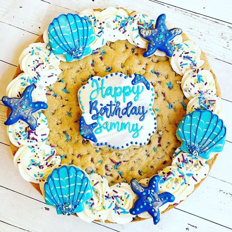 M&A's Bakery on Instagram: “Under The Sea Themed Cookie Cake  🧜‍♀️  #underthesea #customsugarcookies #cookiesofinstagram #cookiecake #sandiegosugarcookies” Mermaid Cookie Cake, Beach Cookie Cake, Oneder The Sea 1st Birthday Cookies, Under The Sea Cheesecake, Let’s Shellebrate Birthday, Beach Theme Cookie Cake, Sea Shell Cake Idea, Seashell Cookies, Beach Theme Birthday