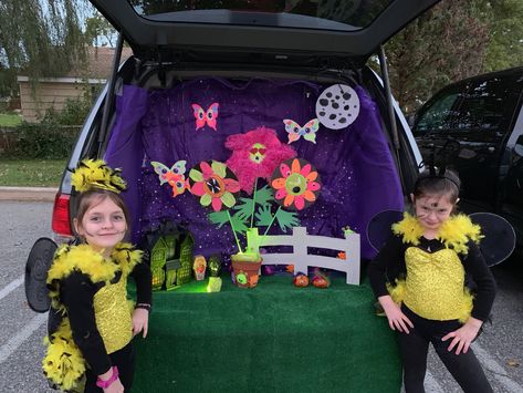 Our scary springtime trunk or treat was based around our girls wanting to be zom-bees!  It has a three-headed flower, a light-up haunted house, little monsters hiding and scary butterflies! Garden Trunk Or Treat, Butterfly Theme, Trunk Or Treat, Halloween Inspiration, Garden Lovers, Butterfly Garden, Little Monsters, Our Girl, Haunted House