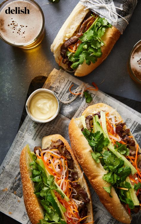 As far as Vietnamese street food goes, bánh mì earns top rankings for its irresistibly savory flavors—umami-packed pork, creamy mayonnaise, crunchy vegetables, and a light crispy baguette come together for sandwich perfection. Banh Mi Aesthetic, Lime Noodles, Bread Branding, Banh Mi Recipe, Street Food Design, Vietnamese Street Food, Bahn Mi, Banh Mi Sandwich, Street Food Market