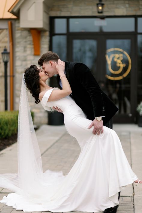 Romantic dip kiss pose of newlyweds outside Venue 3Two. Dip Kiss Pose, Kiss Pose, Helpless Romantic, Dip Kiss, Grand Rapids Wedding, Luxury Wedding Photography, Grand Rapids, Luxury Wedding, Wedding Makeup