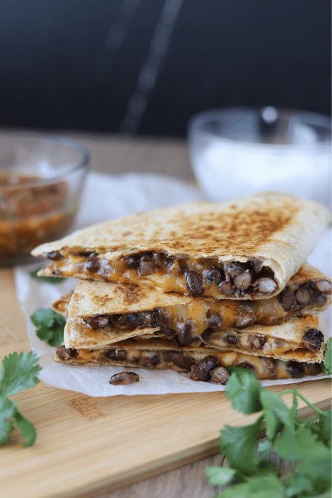 Easy Black Bean and Cheese Quesadillas Cheese Quesadilla Recipes, Bean And Cheese Quesadilla, Cheese Quesadilla Recipe, Cheese Quesadillas, Whole Wheat Tortillas, Cheese Quesadilla, Quesadilla Recipes, Monterey Jack, Monterey Jack Cheese