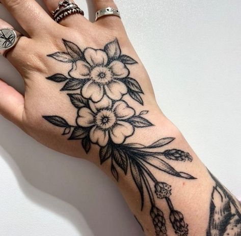 Small Tattoo Filler Ideas For Women, Pretty American Traditional Tattoo, Flowers Hand Tattoo, Floral Hand Tattoos, Wrist Tattoos Unique, Floral Hand Tattoo, Hand Flower Tattoo, Vintage Aesthetic Tattoos, Coverup Tattoo Ideas