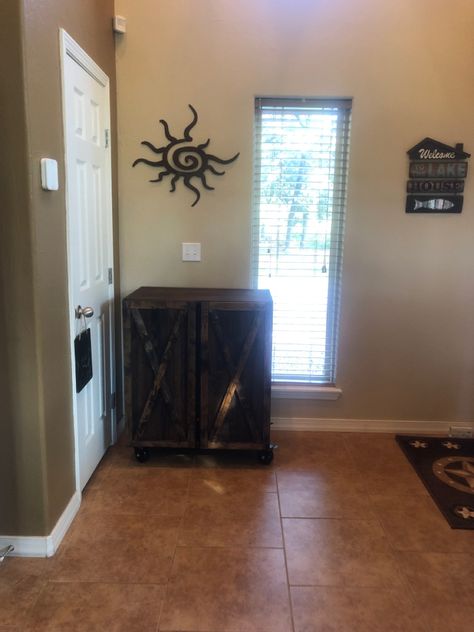 I framed up the doors with “x” pattern using up-cycled fence wood and stained everything dark walnut. Casters we’re sourced on amazon. Mini Fridge Storage, Ivar Cabinet, Cabinet On Wheels, Ikea Ivar Cabinet, Kitchen Set Up, Ikea Ivar, Laminated Mdf, Fridge Storage, Craft Area