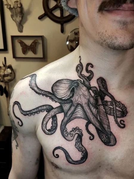 25 Octopus Tattoos for Marine Loving Men (2021) - The Trend Spotter Octopus Tattoo Back, Octopus Back Tattoo, Octopus Shoulder Tattoo, Hai Tattoo, Kraken Tattoo, Tattoo On Shoulder, Octopus Tattoo Design, Octopus Tattoos, Tattoos Mandala