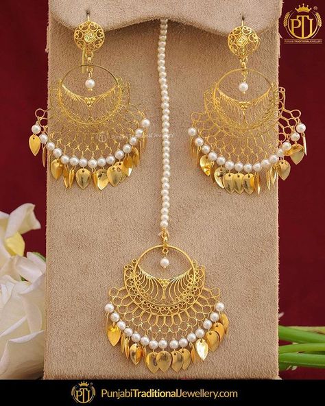 featured:-Gold Finished Pippal Patti Earring & Tika Set Shop our latest collection at our store or visit our website today to buy.. You may also DM us OR contact us at 91 9914721111 to buy. Image copyright 2k18 Punjabi Traditional Jewellery WORLDWIDE SHIPPING AVAILABLE Free Shipping in India Cash on delivery available for India All kinds of Debit/Credit Cards or other payment methods are accepted #punjabi #traditional #Wedding #churra #WeddingChurra #punjabichura #bridal #bridalstudio Punjabi Traditional Jewellery, Tikka Jewelry, Bridal Suits, Mang Tikka, Suits Punjabi, Indian Jewelry Earrings, Jewellery Indian, Traditional Jewellery, Indian Jewellery Design Earrings