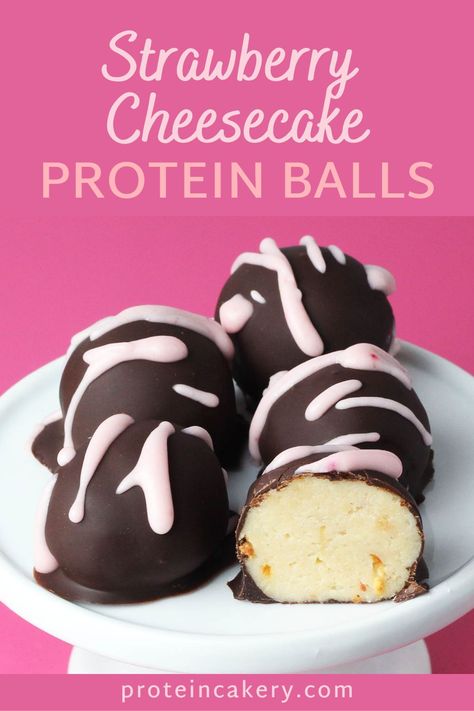 These strawberry cheesecake protein balls are no-bake and easy to make. Made with protein powder for a quick and delicious strawberry cheesecake treat! Great protein dessert or snack idea. Cheesecake Protein Balls, Protein Cheesecake Bites, Muscle Recipes, Protein Cake Pops, Healthy Balls, Bites Ideas, Easy Protein Snacks, Healthy Protein Desserts, Protein Sweets