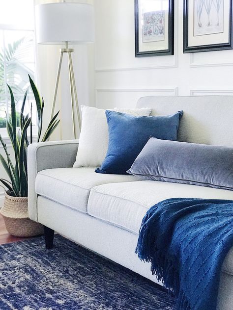 Adding velvet throw pillows and cozy throw blankets to our sofa is an easy way to make our living room feel cozy for winter - jane at home - living room decor Decorating With Blue And White, Decorating With Blue, Stylish Bedroom Design, Fall Decorating Ideas, White Sofa, Coastal Living Rooms, Stylish Bedroom, Dressing Room Design, Living Room Diy