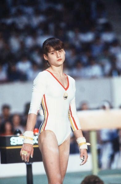 Nadia Comaneci Perfect 10, Famous Gymnasts, Alina Kabaeva, Nadia Comaneci, Bruce Lee Photos, Leotard Fashion, Anna Pavlova, Gymnastics Pictures, Olympic Gymnastics