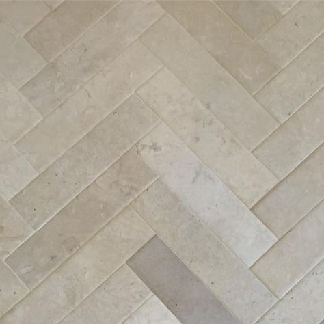 Craftsman Court Ceramics on Instagram: "New Limestone herringbone floor installation in our showroom showing a beautiful range that is perfect for any space! #tile #showroom #tilelove #stone #herringbone #limestone #beige #white #flooring #floor #marble #trim #thassos #interior #exterior #design #interiordesign #ihavethisthingwithfloors" Herringbone Stone Flooring, Herringbone Porcelain Tile Floor, Ceramic Tile Floor Living Room, Herringbone Limestone Floor, Beige Herringbone Tile Floor, Limestone Herringbone Floor, Limestone Tiles Kitchen, White Herringbone Floor, Tile That Looks Like Limestone