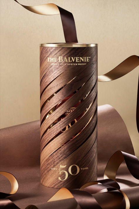 This incredible whisky is more than just a single malt, The Balvenie Fifty is crafted with care to deliver an exceptional experience through its unique elements. Beginning  with the talent of our Malt Master, Kelsey McKechnie, and continuing to the casing, which combines exquisite materials in a complex structure that represents our interwoven stories. Bottle Packaging Design Boxes, Bottle Packaging Design, Whisky Collection, Whiskey Brands, Alcohol Packaging, Perfume Box, Perfume Packaging, Box Packaging Design, Single Malt Whisky