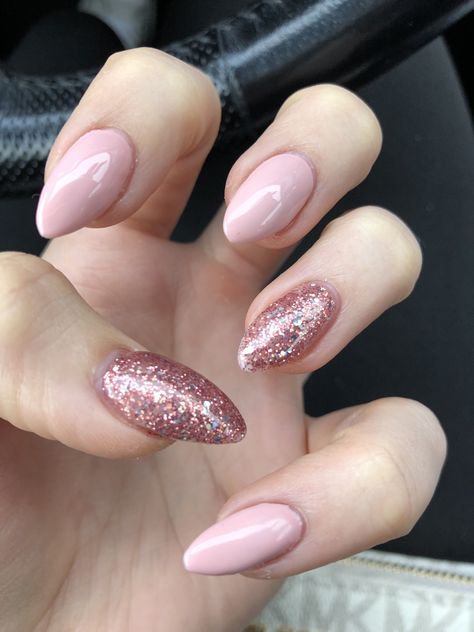 Nude pink and sparkly acrylic nails Sparkly Pink Nails Acrylics, Pink And Sparkly Nails, Pink Nails Sparkle, Pink Sparkly Acrylic Nails, Pink Glitter Nail Designs, Sparkly Pink Nails, Nude Pink Nails, Pink Sparkly Nails, Pink Glitter Nail