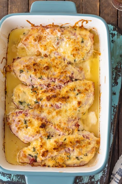 Chicken Cordon Bleu is my favorite recipe for entertaining a crowd. Instead of spending time rolling and stuffing, this EASY Chicken Cordon Bleu Recipe has layers of chicken, ham, cheese, and bread crumbs, and then it's covered with this delicious white wine dijon sauce. Get ready to learn how to make Chicken Cordon Bleu (with the BEST chicken cordon bleu sauce ever). Chicken Cordon Blue Sauce Recipes, Chicken Cordon Blue Sauce, Cordon Bleu Sauce, Chicken Cordon Bleu Sauce, Best Sauce For Chicken, Baked Chicken Cordon Bleu, Easy Chicken Cordon Bleu, Cordon Bleu Recipe, Dijon Sauce