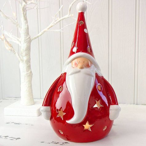 ceramic santa tealight holder by lisa angel homeware and gifts | notonthehighstreet.com Santa Drawings, Holiday Pottery, Paper Mache Christmas, Pottery Christmas, Ceramic Christmas Decorations, Christmas Santas, Ceramic Santa, Christmas Pots, Lisa Angel