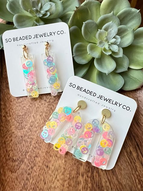 Excited to share this item from my #etsy shop: Smiley face Dangle Earrings | Rainbow | Resin | pastel Funky Resin Earrings, Smiley Face Clay Earrings, Uv Resin Craft Ideas, Summer Resin Earrings, How To Make Resin Earrings, Resin Earrings Ideas, Resin Earrings Diy, Uv Resin Earrings, Pastel Resin