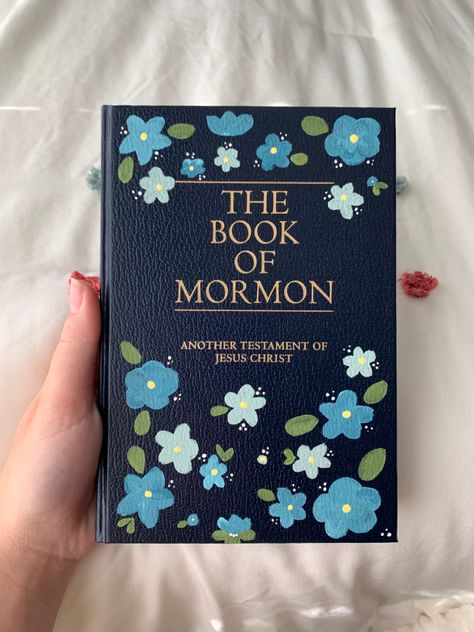 Book Of Mormon Art Paintings, Painted Boom Of Mormon, Diy Painted Book Of Mormon, Paint On Book Of Mormon, Book Of Mormon Decorations, Painting The Book Of Mormon, Easy Book Of Mormon Painted Cover, Book Of Morning Painting, Book Of Mormon Cover Painting Ideas