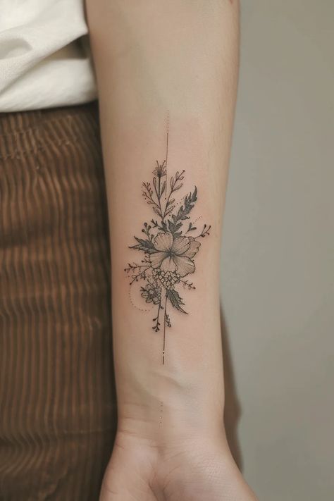 36 Stunning Black Feminine Floral Tattoo Designs You'll Love Tattoos Of Wildflowers, Wrist Floral Tattoos For Women, Women’s Arm Tattoos Floral, Birth Flower Tattoos Placement Arm, Pretty Floral Tattoos, Four Flowers Tattoo, Unique Birth Flower Tattoos, California Wildflowers Tattoo, May And July Birth Flower Tattoo