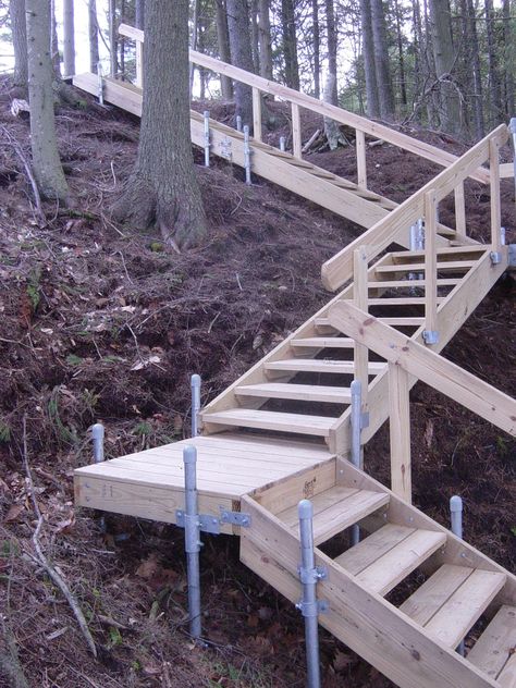 The perfect lakeside deck, this multi-level wood deck breaks up the steep descent to the water YESSS -- for river or lake house in hill country! Description from pinterest.com. I searched for this on bing.com/images Landscape Stairs, Sloped Yard, Sloped Backyard, Garden Stairs, Outdoor Steps, Hillside Landscaping, Deck Stairs, Meteor Garden 2018, Garden Steps