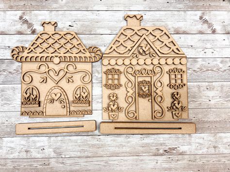 Gingerbread Houses Shelf Sitters, DIY, Laser Cut, Craft Kit. Unfinished kit you must paint and assemble. No other craft supplies are provided.  Large House 10.34" H x 8.18" W Small House 9" H x 8.46" W   All pieces are made using 1/8" MDF as shown in photos.  MDF is a medium density fiberboard and is an engineered wood product. Indoor use only! These are laser cut items and will have dark edges and/or char marks, you can easily sand them or paint over. This is not a defect and it will not be replaced. A magic eraser works great at removing the marks as well. Remember these are laser cut and will have a slight burnt wood smell, this goes away over time.  Shipping to USA only at this time. Once we have shipped the package and it's in possession of the USPS the delivery is out of our control. Shelf Sitters Diy, Diy Laser Cut, House Shelves, Burnt Wood, Laser Ideas, Shelf Sitters, Large House, Wood Product, Magic Eraser