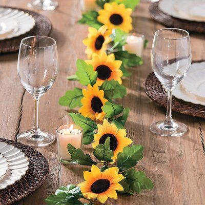 Add a sunny, festive air to your party decorations with this great Faux Sunflower Greenery Garland. These bright and fun flowers make an awesome backdrop at your wedding ceremony or wedding reception, or any special event. Attach this garland to an arch under which you'll take your vows! | Primrue 6' Greenery Garland | 9.2 H x 72 W x 1 D in | Wayfair Sunflower Themed Birthday Party, Sunflower Party Ideas, Sunflower Birthday Party Decoration, Red Sunflower Wedding, Sunflower Garland, Sunflower Birthday Parties, Baby Shower Girl Diy, Sunflower Wedding Decorations, Sunflower Birthday