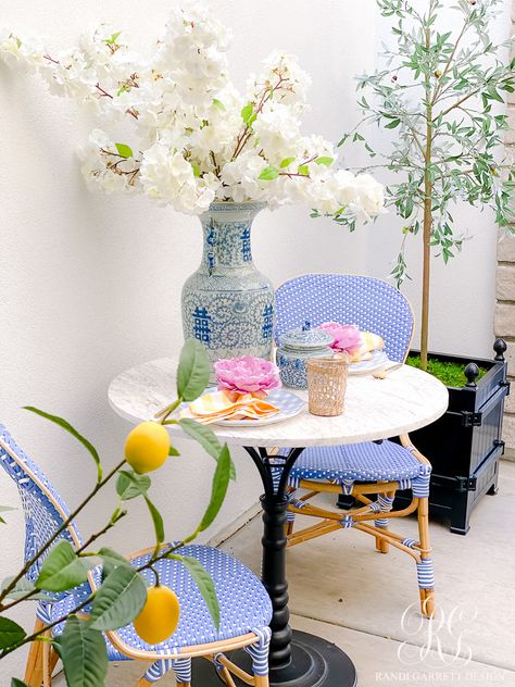 Parisian Patio Decor, White Hydrangea Wreath, Marble Bistro Table, Paris Bistro, Porch Outdoor, Front Courtyard, Faux Floral Arrangement, Decor Entryway, Bistro Chairs