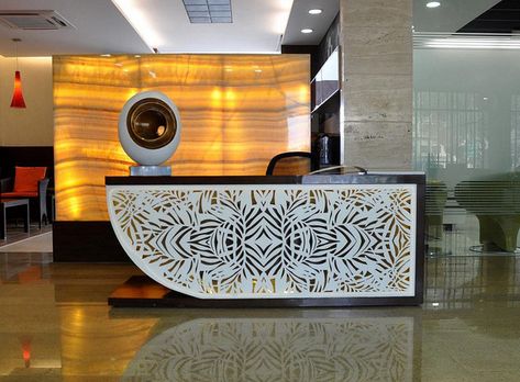 “Corian® office spaces” theme winner, submitted by Oystra Concepts. Corian® was cut and thermoformed to create this reception desk. #corian Corian Design, Office Furniture Layout, Fabric Store Design, Hotel Lobby Design, Reception Desk Design, Counter Desk, Modern Reception, Corporate Office Design, Bedroom Door Design