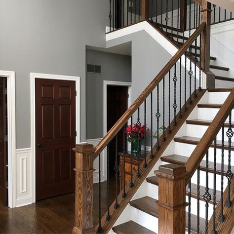 Pewter Cast SW 7673 - Timeless Color Paint Color - Sherwin-Williams Foyer Paint Colors, Foyer Paint, Wood Railings For Stairs, Traditional Staircase, Staircase Remodel, Neutral Paint Color, Neutral Paint Colors, House Color Schemes, Sherwin Williams Paint Colors