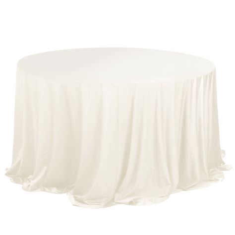 Quantity: 1 Round Tablecloth Material: Scuba Polyester Color: Ivory Size: 132" Round Thickness: 220 Gsm Hemmed Edges For An Exquisite Look. 1 Piece, Seamless Design Gives Floor Length Hang On Standard 6Ft (72") Tables Features: Stain And Wrinkle Free, Thick, Soft, Smooth, Durable, Gentle Stretch. Additional Information: Care Instruction: Machine Washable & Dryable. Do Not Bleach. Uses: Events, Restaurants, Banquet Halls, Hotels, And Hospitality Environments. - 132" Ivory Premium Scuba Wrinkle Fr Wedding Table Cloth, Table Dinner, Wedding Tablecloths, White Table Top, White Table Cloth, Banquet Hall, Round Tablecloth, Round Table, Color Ivory