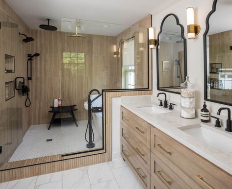 Custom 3 drawer vanity alder wood stained Driftwood. Delta Faucet plumbing fixtures in Matte Black. The wall tile is Kenridge Ribbon Maple Brown 24x48 Wood Look Matte Porcelain Tile. The shower floor is a white hexagon tile from Daltile. Ribbon Tile Shower Wall, Ivy Hill Tile Montgomery Ribbon Maple, Marble And Wood Look Tile Bathroom, Wood Vanity Black Tile Floor, Kenridge Ribbon Maple Tile Bathroom, Black Tile Natural Wood Bathroom, Kenridge Ribbon, Wood Look Tile Bathroom, White Hexagon Tile