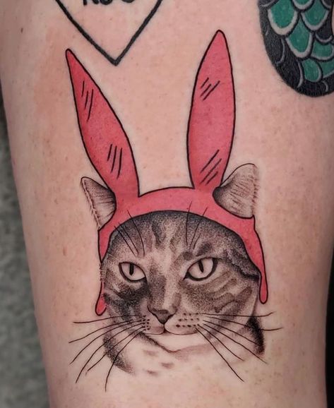 Custom cat with Bob's Burgers' Louise bunny ears done by @gentle_jaz of @fleurnoiretattoo in Brooklyn  #fleurnoiretattoo #tattoo #cattattoo #cat #bobsburgers #bobsburgerstattoo #detailedtattoo #inspiration #inspirationtattoo #nyc #nyctattoo #newyorkcity #linetattoo #brooklyn #williamsburg #bushwick #madeinbrooklyn #nyctattoo #williamsburgtattoo #brooklyntattoo Louise Bunny Ears, Bobs Burgers Louise, Brooklyn Tattoo, Nyc Tattoo, Detailed Tattoo, E Tattoo, Tattoo Parlors, Tattoo On, Custom Cat