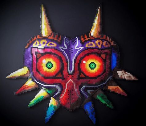 Beads and Cakes! on Instagram: “Majora’s mask from The Legend of Zelda!  Made out of mainly hama beads and a few perler and artkal beads! Inspired by @lain_pixelart and…” Zelda Perler Beads, Perler Beads Zelda Korok, The Legend Of Zelda Perler Beads, Legend Of Zelda Perler Beads, Perler Majoras Mask, Zelda Tears Of The Kingdom Perler Beads, Zelda Perler, Majoras Mask Perler Beads, Zelda Pattern