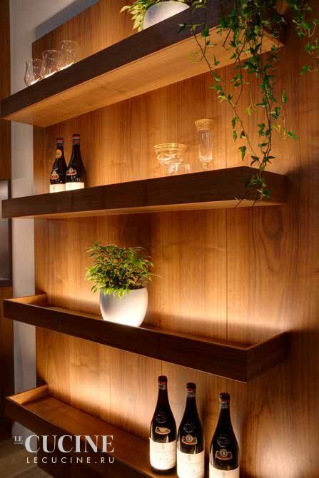 Built In Walnut Shelves, Shelving With Lights, Bourbon Shelves, Column Interior, Salon Shelves, Restaurant Shelving, Columns Interior, Seating In Kitchen, Built In Shelving