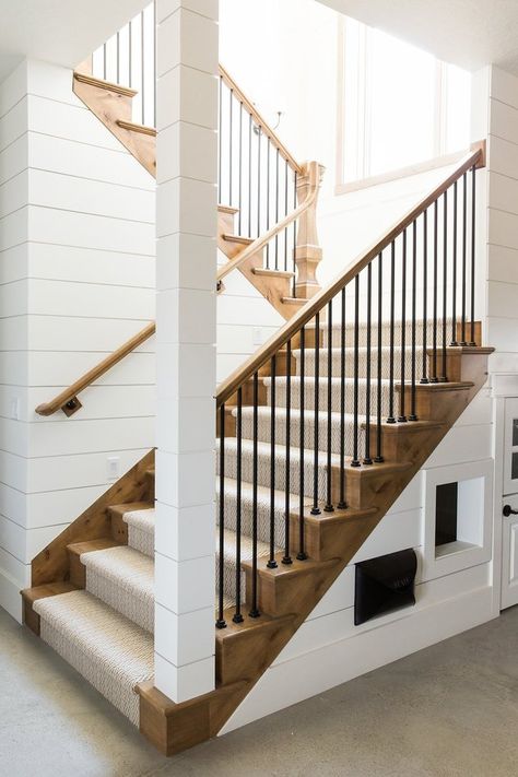 What do you think of when you hear the word rustic? Maybe neutral tones, vintage decor, or earthy accessories? Whether you live in an idyllic country cabin or a home that's far from farmhouse, there are ways to include rustic elements — starting with the staircase. Here are seven rustic stair railing ideas that'll add charm and patina to your entryway. #hunkerhome #stairway #rustic #farmhouse #farmhousestairs Farmhouse Staircase, Rustic Stairs, Diy Staircase, Black Sconces, Building Stairs, Staircase Ideas, Staircase Decor, Basement House, Basement Stairs