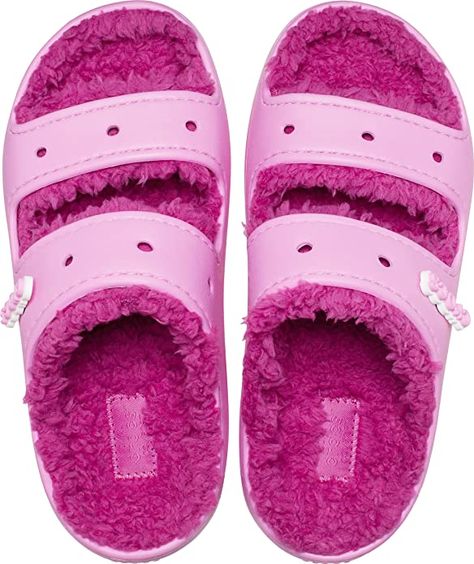 • Imported • Ethylene Vinyl Acetate sole • FUZZY SLIPPERS: The new Classic Cozzzy Sandal features a soft, fuzzy liner, style-forward heightened outsoles and two upper straps that offer enhanced foot security. • WARM & FUZZY SLIDES: Cozy slides with a toasty lined fuzz are the Crocs women and men need to keep the feeling going all season. • WHAT SIZE SHOULD I BUY?: These shoes offer a relaxed fit and we recommend ordering a size up to the next largest whole size. • HOUSE SLIPPERS: Thes Classic Cozzzy Sandal, Vans Socks, Spiderman Kids, Saltwater Sandals, High Heel Slippers, Crocs Classic Clogs, Muck Boots, Fuzzy Slippers, Heel Slippers