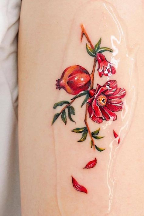 You're going to love this feminine pomegranate tattoo design idea. This is a small fruit tattoo with leaves and branches. Pythia Tattoo, Pomegranate And Narcissus Tattoo, Pomegranate Branch Tattoo, Pomegranate Tree Tattoo, Pomegranate Art Illustrations, Pomegranate Tattoo Hades And Persephone, Pomegranate Tattoo Simple, Pomegranate Flower Tattoo, Coven Tattoos