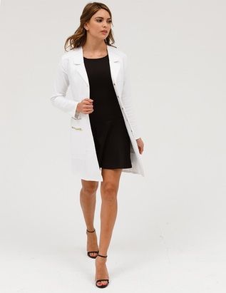 The Signature Lab Coat in White is a contemporary addition to women’s medical outfits. Shop Jaanuu for scrubs, lab coats and other medical apparel. Doctor Outfit Women White Coat, Doctor Outfit Women, White Coat Ceremony Outfit, Doctor White Coat, Women's Lab Coats, White Lab Coat, White Coat Ceremony, Doctor Outfit, Nursing Fashion