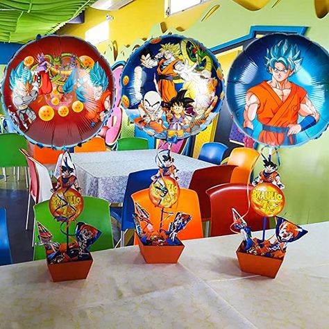 I like the printable in the center of the stick, and I could wrap tissue paper around a base to get orange bottom. Dragon Ball Z Party Centerpieces, Dragon Ball Z Centerpiece, Naruto Centerpiece Ideas, Dragon Ball Z Balloon Decor, Dragon Ball Z Centerpieces Party Ideas, Naruto Centerpieces, Dragon Ball Z Birthday Party Decorations, Dragon Ball Z Centerpieces, Dragon Ball Z Party Decorations