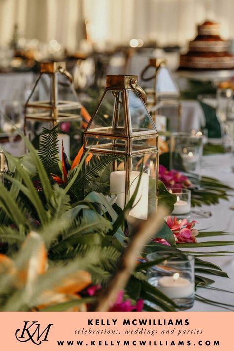 Tropical Lantern Centerpieces, Tropical Candle Centerpiece, Wedding Centerpieces With Lanterns, Centerpieces With Lanterns, Tropic Wedding, Tropical Wedding Centerpieces, Moody Tropical, Tropical Centerpieces, Lantern Centerpiece Wedding