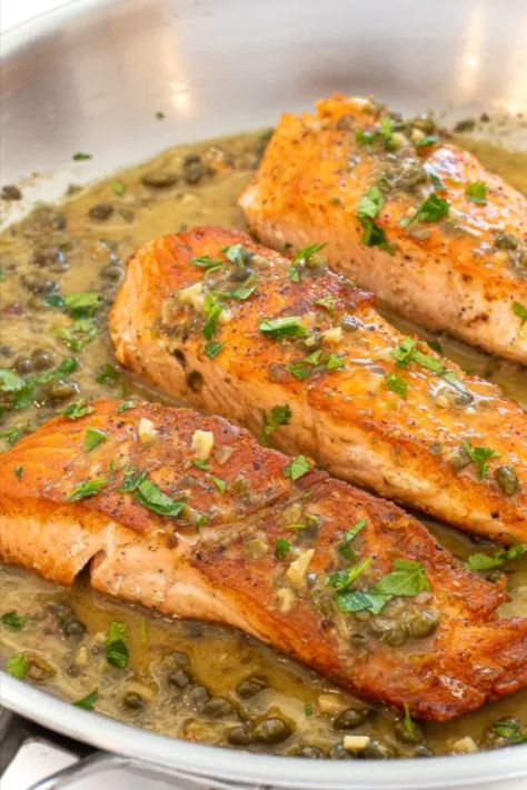 This recipe for the Best Easy Healthy & Creamy Salmon Piccata for dinner features perfectly sautéed salmon along with a tangy lemon and caper sauce. It just might be the perfect dinner! Pair it with rice or mashed potatoes and some steamed veggies for a wonderful, gourmet meal. Salmon Picatta Recipe, Sauteed Salmon, Salmon Piccata, Piccata Sauce, Creamy Salmon, Best Easy Dinner Recipes, Chef Savvy, Piccata Recipe, Caper Sauce