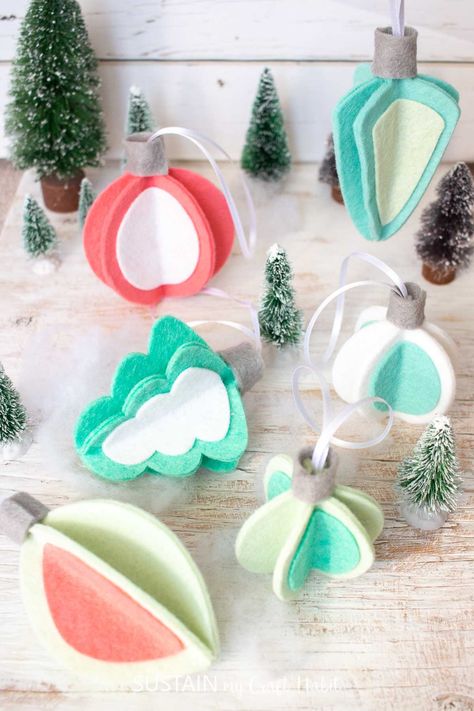 Retro-Inspired DIY Felt 3D Christmas Ornaments Felt Spring Flowers, 3d Christmas Ornaments, Felt Ornaments Diy, Felt Christmas Tree Decorations, Diy Felt Christmas Ornaments, Diy Felt Christmas Tree, Colourful Christmas, Paper Christmas Ornaments, Sustainable Christmas